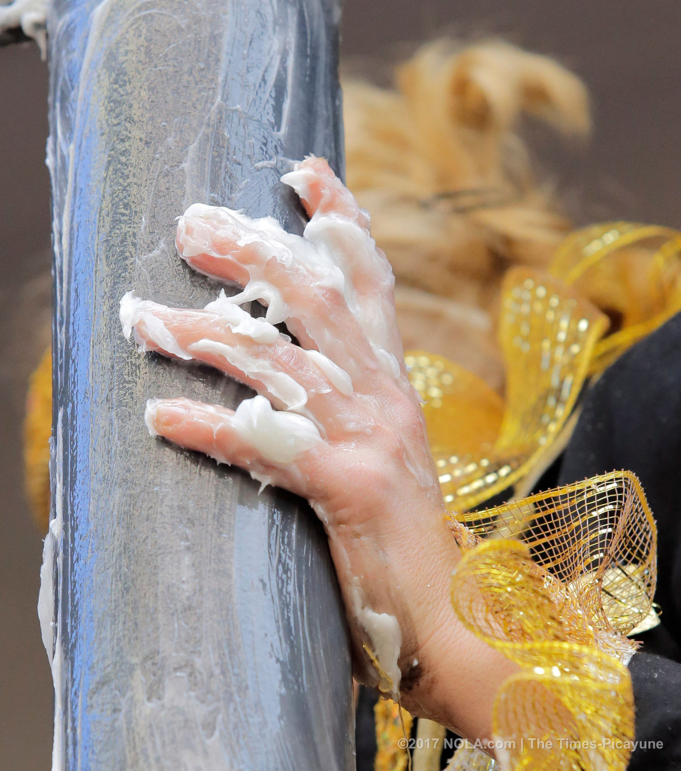 Only on Bourbon Street: Greasing of the Poles for Mardi Gras